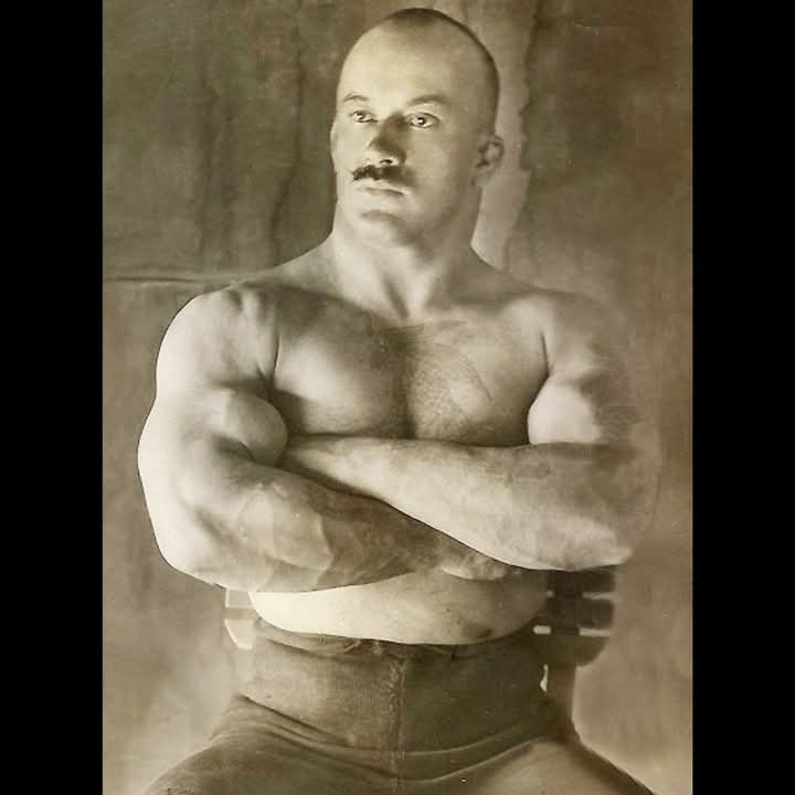 This Wolverine-shaped badass is Peter Krylov, who built his natty limits-shattering 5’5″ 193lbs, 18″ cold-measured biceps, 13″ straight- & cold-measured forearms, & 47cm/18.5″ neck before the era of steroids, in massively impoverished imperial Russia… and if he could do it under those conditions, anyone should be able to.